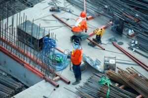 Residential construction site with framing crew at work